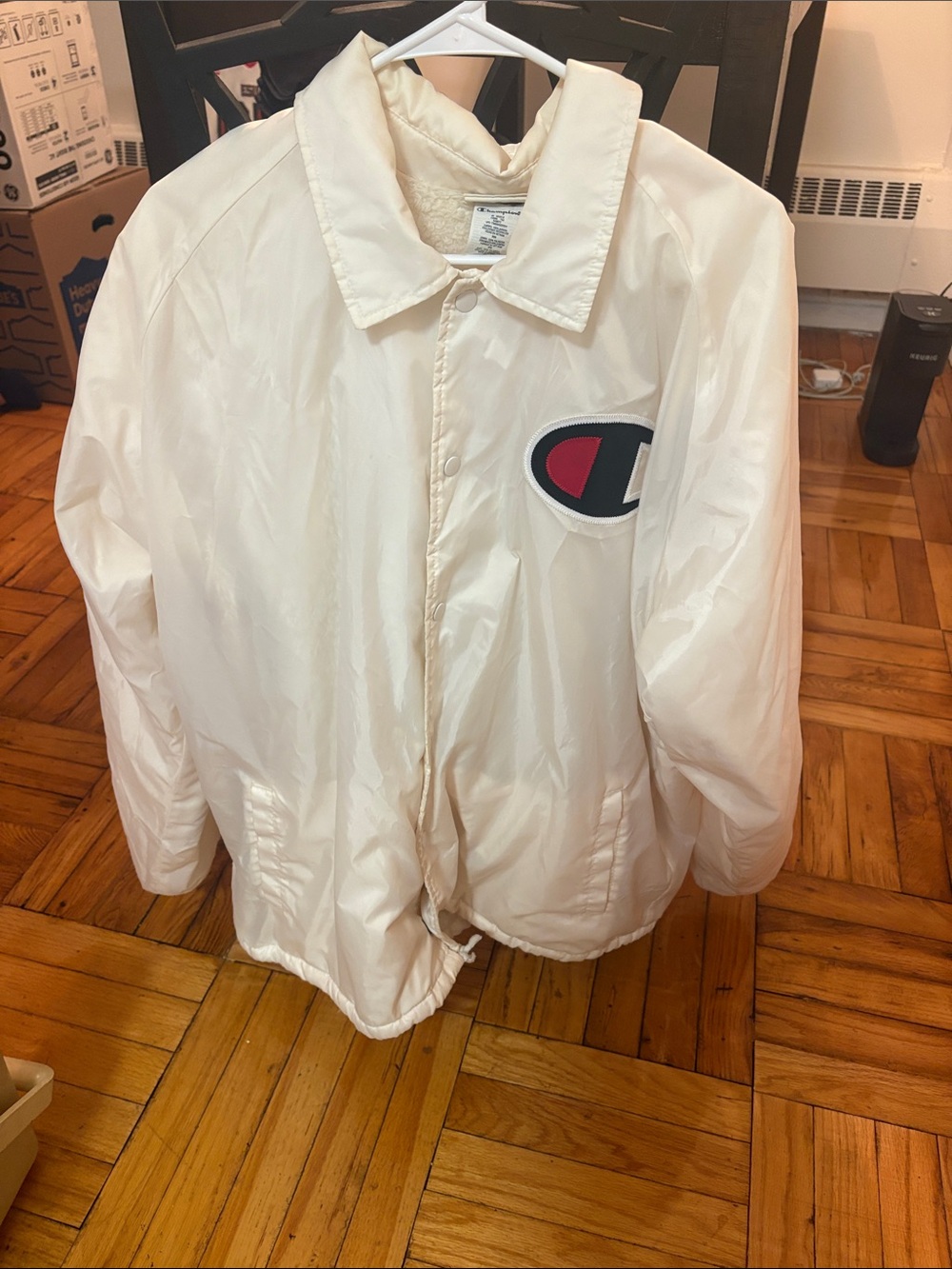 Champion Mens Cream Coach Jacket with Red & Black Logo Patch